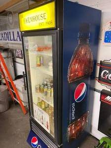 lot 94 image: Large Glass Door Pepsi Cooler Made by True