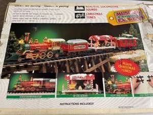 lot 149 image: Musical Christmas Express Train Set