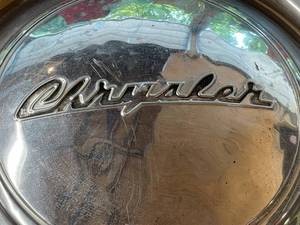 lot 304 image: Vintage Chrome Chrysler Hubcap