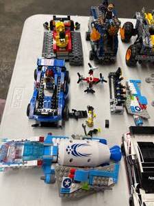 lot 370 image: Large Lot of Legos and Lego-Like Vehicles