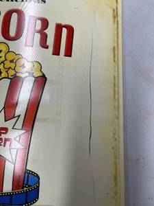 lot 406 image: Popcorn Metal Wall Sign