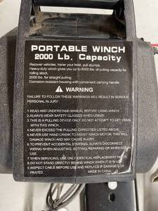 lot 433 image: Portable 2000 LB Winch With Mounting Plate