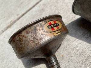 lot 586 image: 2 Vintage Metal Funnels By Huffy and J Mart