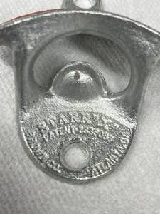 lot 601 image: Vintage Chevrolet Bottle Opener