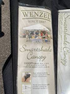 lot 638 image: Wenzel 10 x 10 Expanding Canopy In Rolling Case