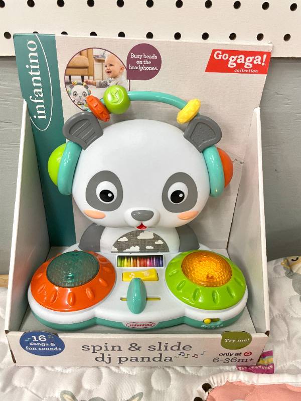 lot 102 image: Spin & Slide DJ Panta & Reversible Llama Crib Quilt.