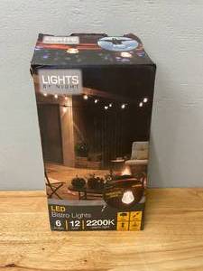 lot 10 image: Lights by Night LED Outdoor Patio Bistro Lights 