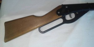 lot 32 image: Daisy Red Ryder Air Gun, Orange end. Wood handle.