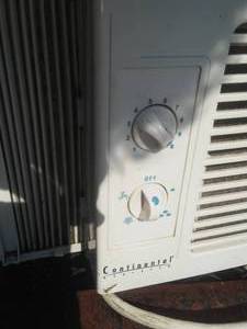 lot 107 image: Continental Window Ac unit. Working condition, 6000 BTV. Cooled 1000 Square Feet. LOC O, Enclosed.