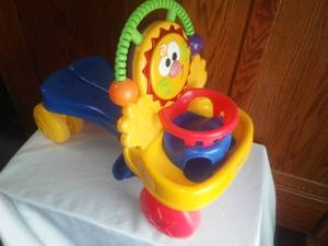 lot 135 image: Fisher Price Scoot along rider. Toddler 23 long.