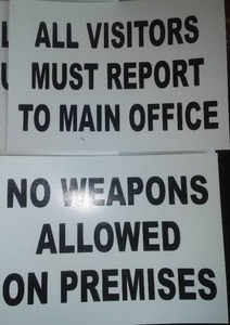lot 142 image: Vinyl signs  Visitors  and Weapons 9 total.