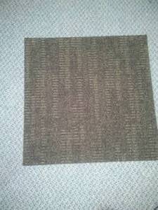 lot 147 image: 8 carpet squares. (24 X 24) 32 sq ft