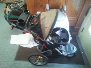 lot 148 image: Baby trend stroller and Graco Booster chair.