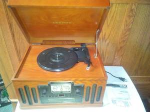 lot 201 image: Crosley retro stereo AM FM, CD, turntable and cassette.