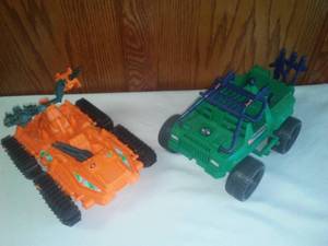 lot 234 image: Two GI Joe vehicles with bombs.