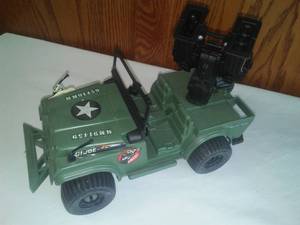lot 238 image: GI Joe Grizzlie Jeep with guns and Bombs.