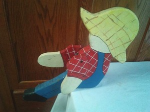 lot 752 image: Vintage Wood Sitting farmer boy.