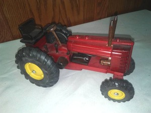 lot 760 image: Wood Farmall Scale Tractor. Amazing
