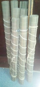 lot 746 image: Roll - up bamboo style blinds -great color.