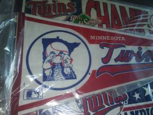 lot 10 image: (3)  Minnesota Twins Pennants 1991, and Emblem.