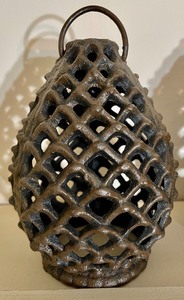 lot 28 image: 3 Cast Iron Candle Covers