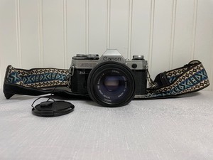 lot 54 image: Canon and Nikon Cameras