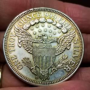 1 TROY OZ. .999 FINE SILVER SEATED DOLLAR DESIGN