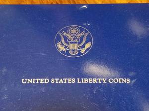 1986 US ELLIS ISLAND COMMEMORATIVE SILVER DOLLAR & CLAD HALF 2 COIN SET