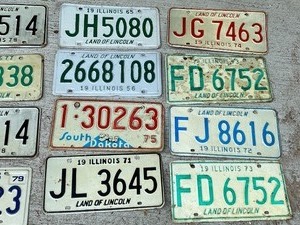 lot 219 image: (13) Vintage License Plates