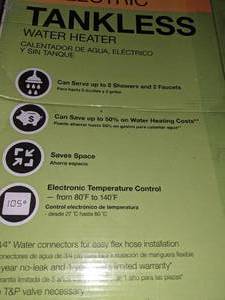 lot 7 image: Rheem Electric Tankless Water Heater New in Open Box