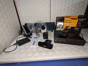 lot 101 image: Keyboard, Cord Protector, Wireless Router, Home Cameras and More