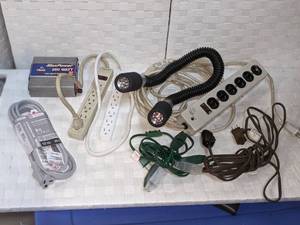 lot 130 image: Power Strips, Extension Cords, DC to AC Power Inverter