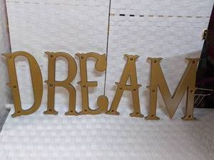 lot 108 image: Pottery Barn Gold Letters That Spell DREAM