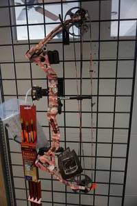 lot 11 image: Bear Apprentice Compound Bow