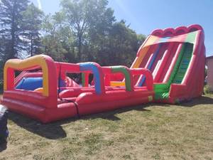 lot 329 image: 56 X 18 X 28 Triple Lindy 28 Tall 3 lane water slide with slip and slide - can be used WET or DRY