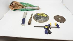 lot 21 image: Two Saw Blades---Slapshot Stapler---Irwin Quick Grip Clamp---Grease Gun---Heavy Tool