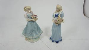 lot 36 image: Two Girl Dolls WFlower Baskets