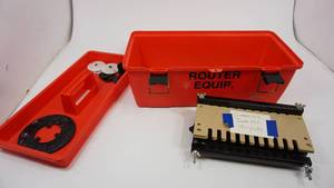 lot 55 image: Red Heavy Plastic Tool Box With Router Equipment (Craftsman Dovetail Template)