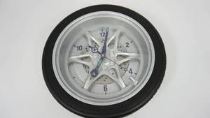 lot 68 image: Tire Battery Operated Wall Clock