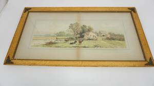 lot 102 image: Framed Print Of Four Cows Grazing By Farm House & Barn By W Carlton