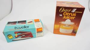 lot 103 image: Rowenta Collapsible Automatic Dry Travel Iron--Oster Automatic Citrus Juicer