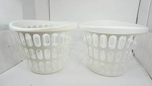 lot 140 image: Two Round White Hard Plastic Laundry Baskets