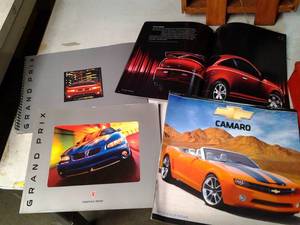 lot 40 image: Pontiac Grand Prix Booklets, Camaeo...