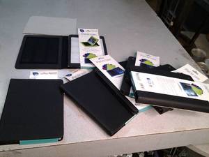 lot 64 image: (7) IPad Air Cases...