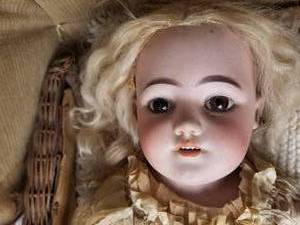 lot 45 image: Antique German Doll with Carriage