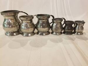lot 83 image: Antique Pewter Measuring Cups
