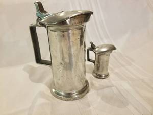lot 84 image: Vintage Pewter Covered Measuring Cups