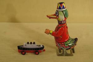 lot 184 image: 2 Tin Toys - Wind Up Walking Duck