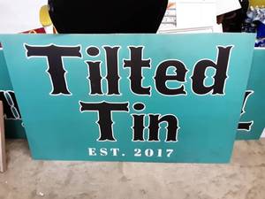 lot 10 image: Tilted Tin Sign 48x31