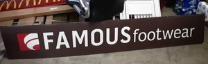 lot 14 image: Famous Footware Sign 17x101